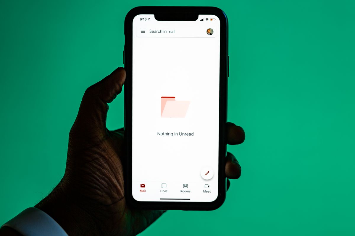 A client checking an email link on a phone